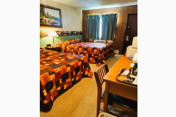Foto van 2 Volle Bedden Met 1 Twin Bed - Vakantiehuis in International Falls - BedRoom